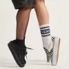 Klassischer Slip-On-Plateauschuh mit Schachbrettmuster Klassischer Slip-On-Plateauschuh mit Schachbrettmuster